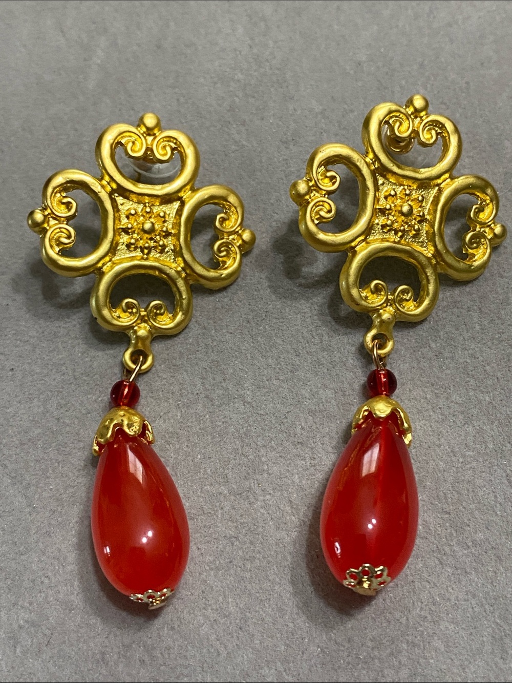 Matte Gold Filigree Drop Earrings with Red Lucite Teardrops